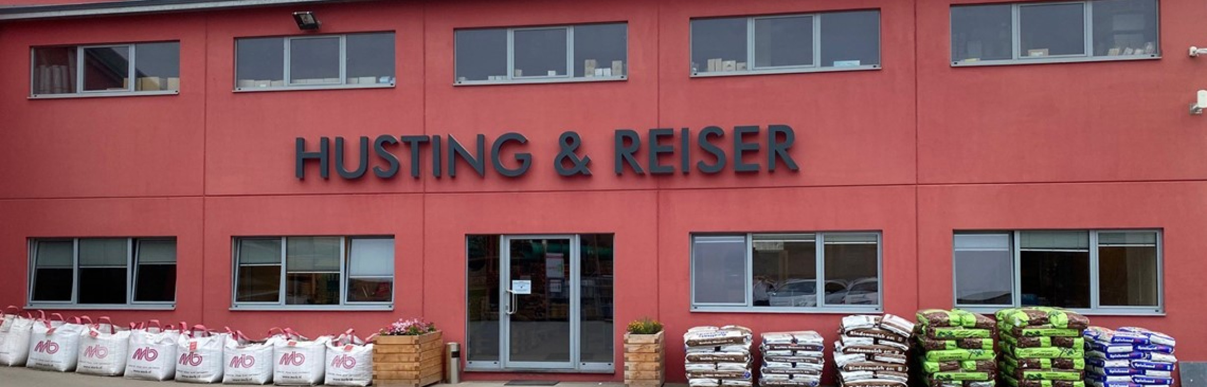 Banner Husting & Reiser