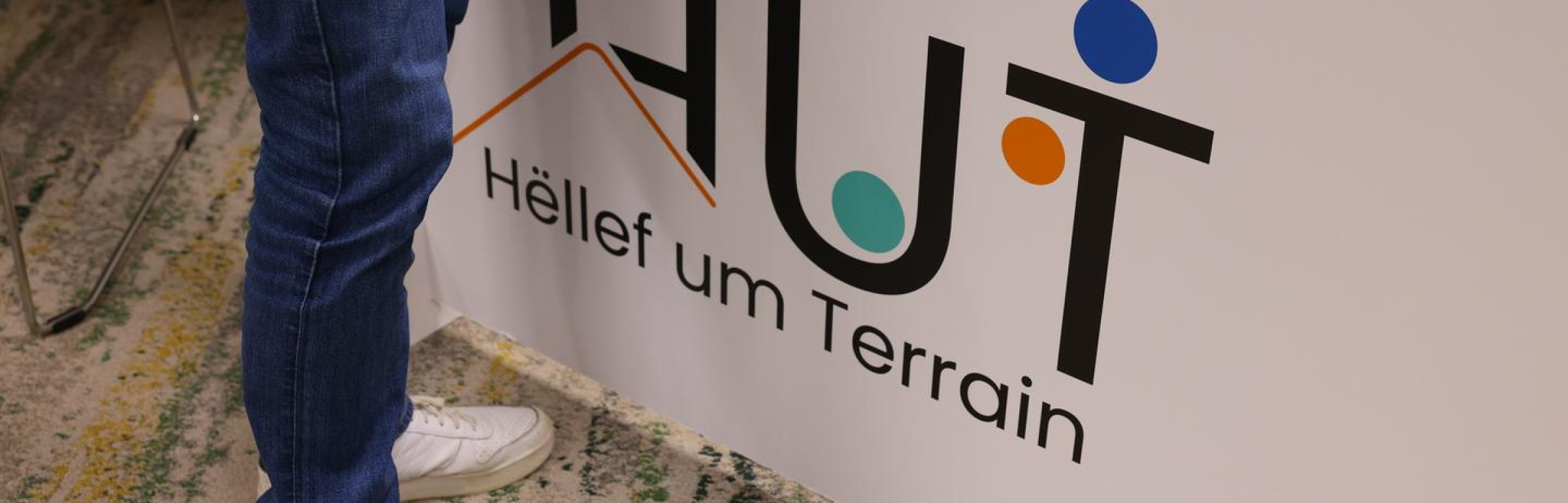 Banner Hëllef um Terrain asbl